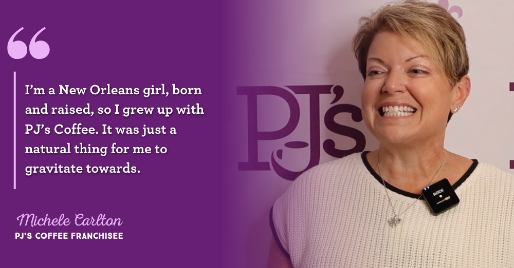 A person smiling in front of a purple wall
AI-generated content may be incorrect.